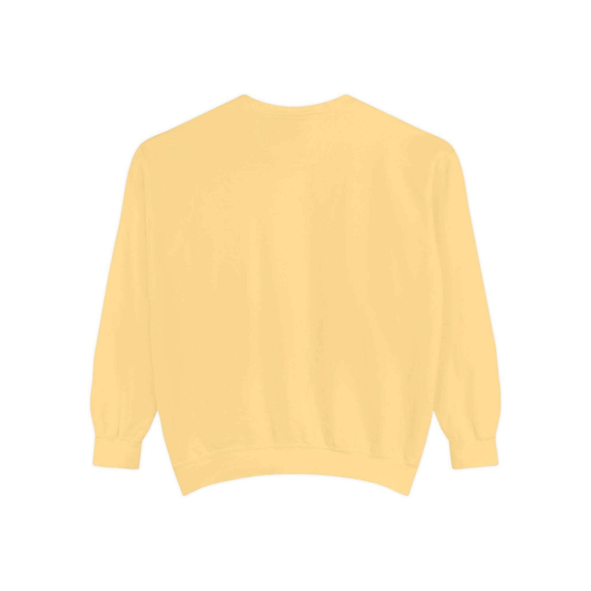 Back view of vintage Christmas Nutcracker sweatshirt in soft yellow with ribbed cuffs and hem