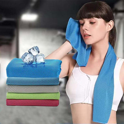 Stack of colorful instant cooling sports towels with ice cubes and woman using blue microfiber sports towel for workout cooling