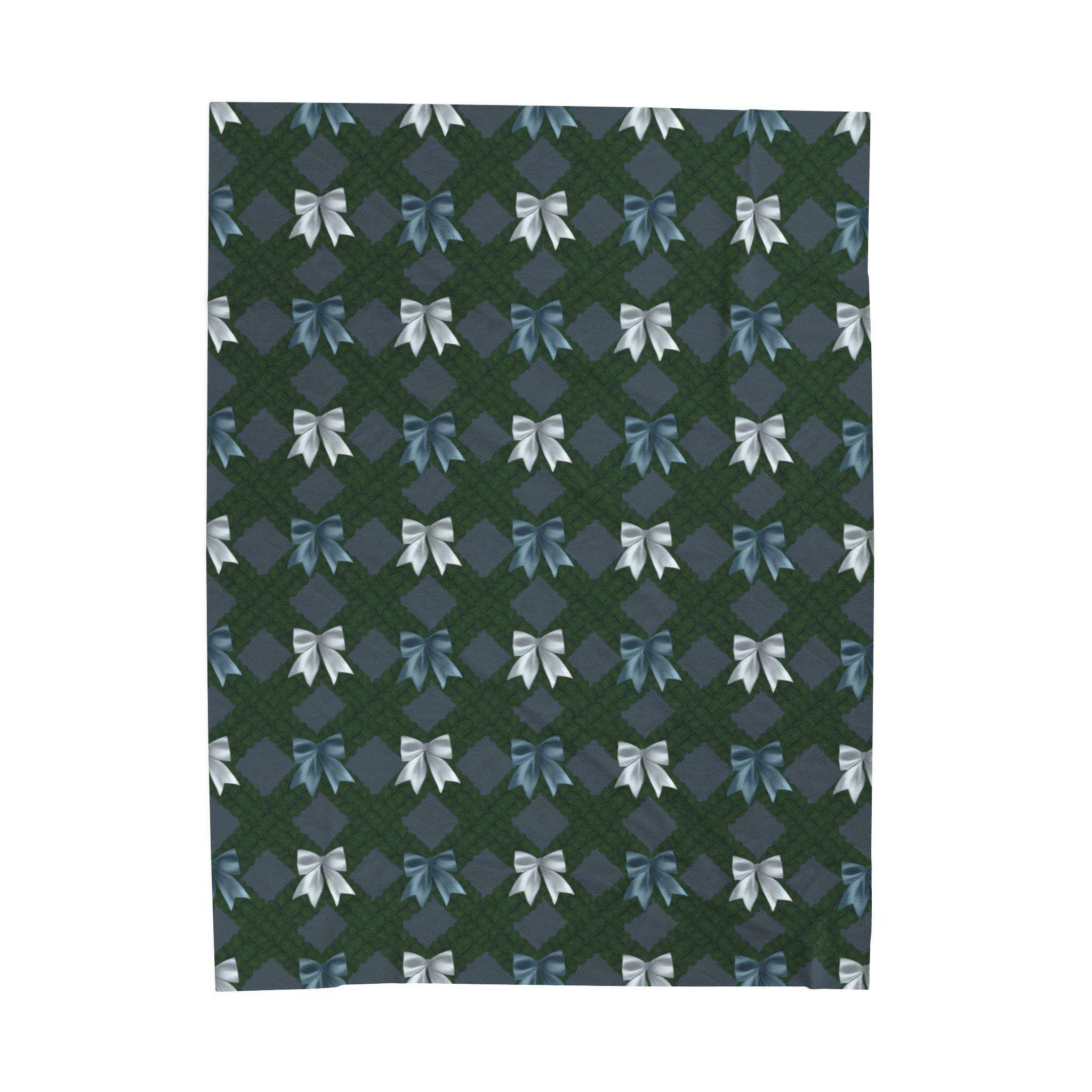 Velveteen plush blanket with winter coquette bows pattern in blue and white on dark background