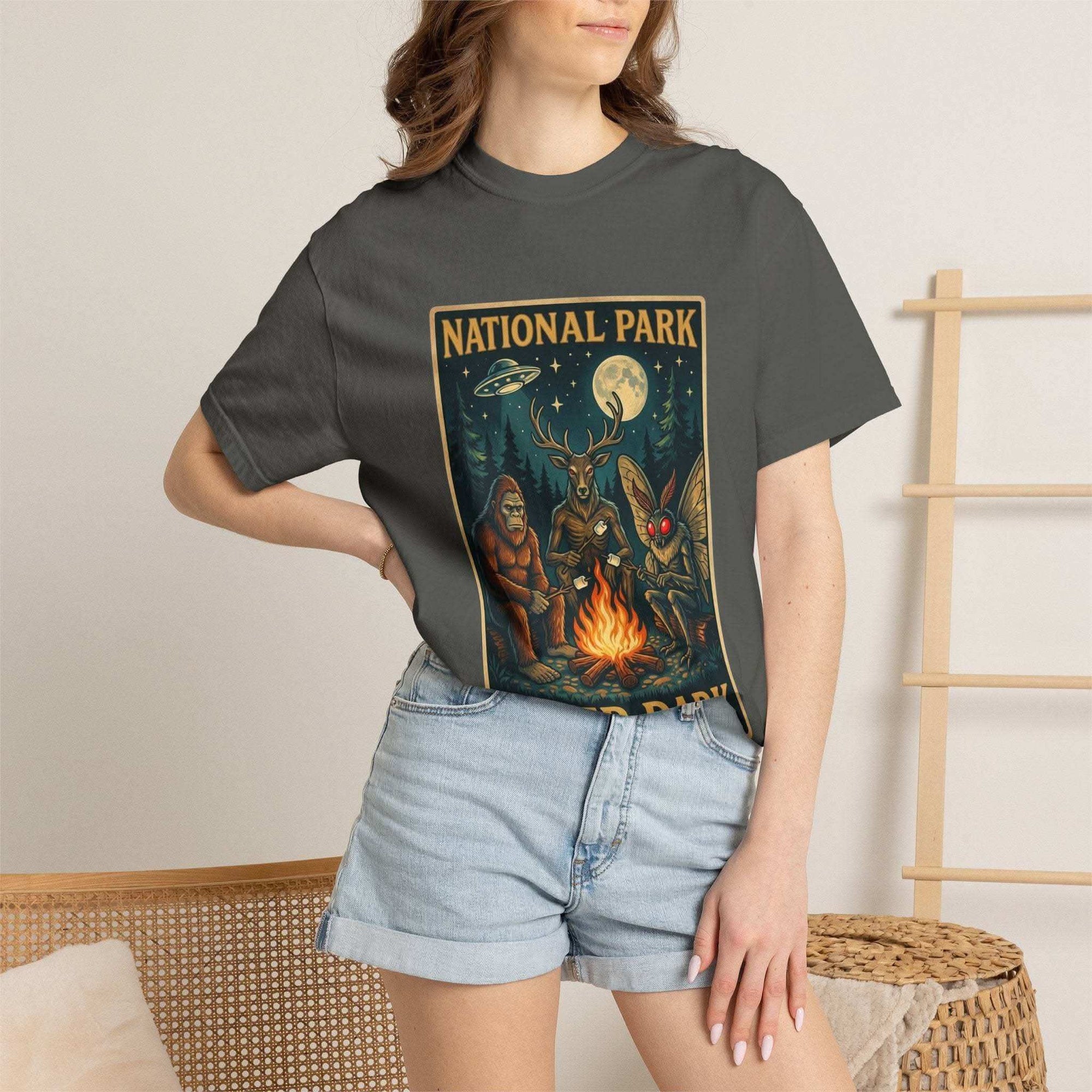 National Park After Dark t-shirt with campfire, Sasquatch, Mothman, and nocturnal woodland creatures design
