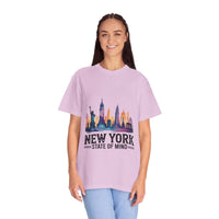 Garment-dyed lilac T-shirt with New York State of Mind graphic and city skyline print worn by smiling woman