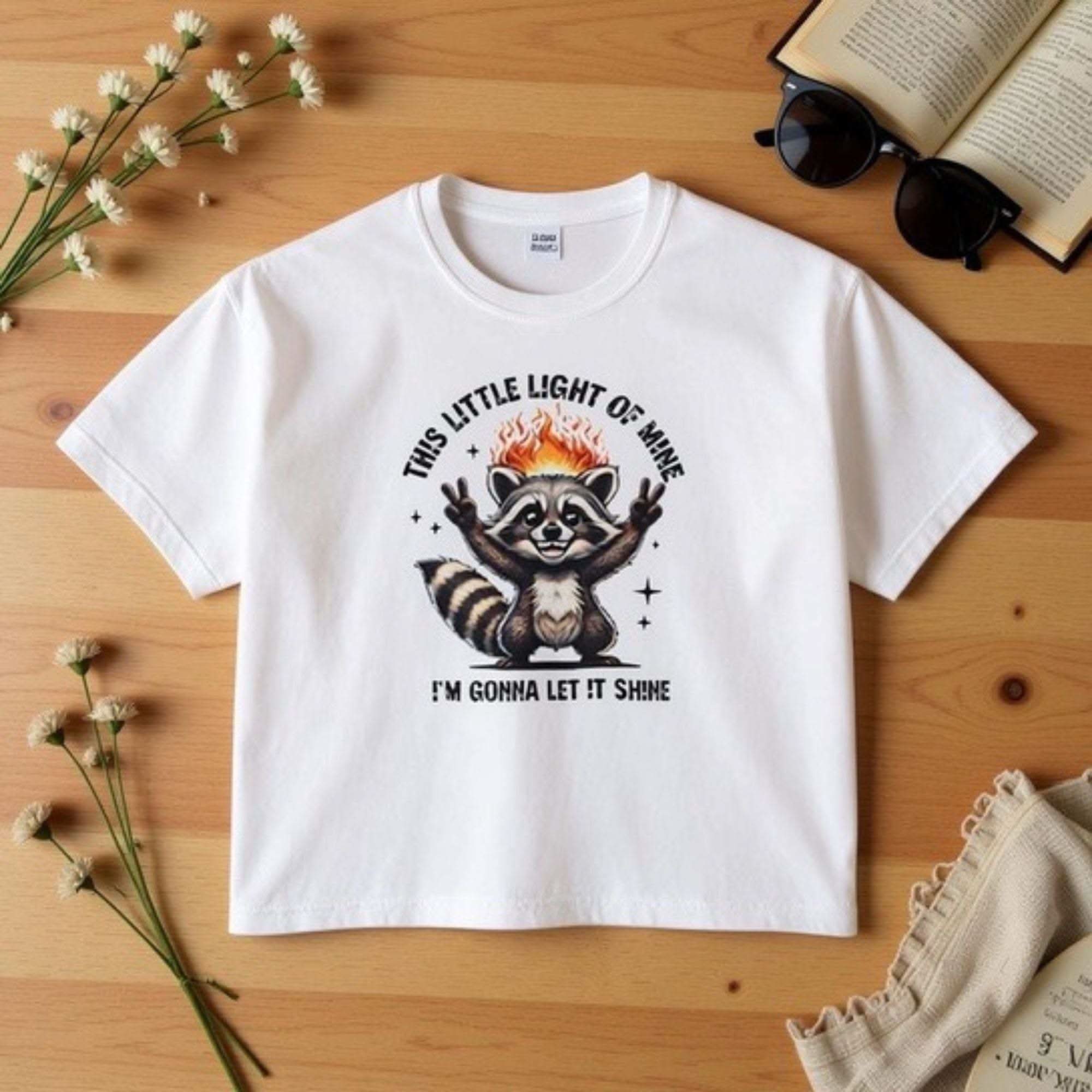 Women's boxy tee with sarcastic raccoon and Little Light of Mine design