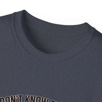 Unisex medium-weight cotton veteran t-shirt with "We Don't Know Them All But We Owe Them All" message