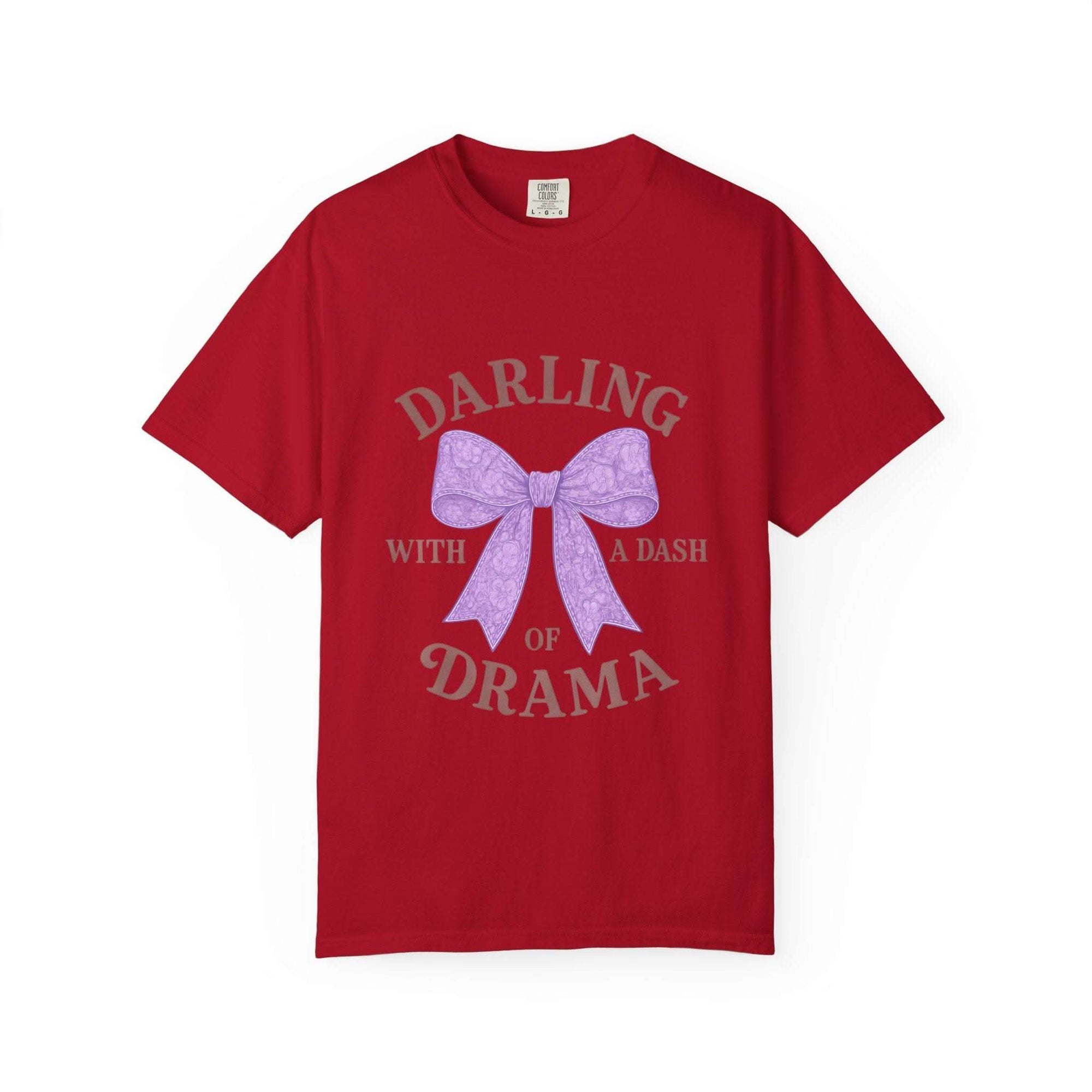 Red t-shirt with a purple bow and text on a white background