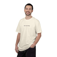Man wearing a white t-shirt with text on a white background