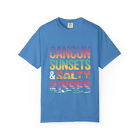 Blue t-shirt with colorful text 'Cancun Sunsets & Salty Kisses' on a white background