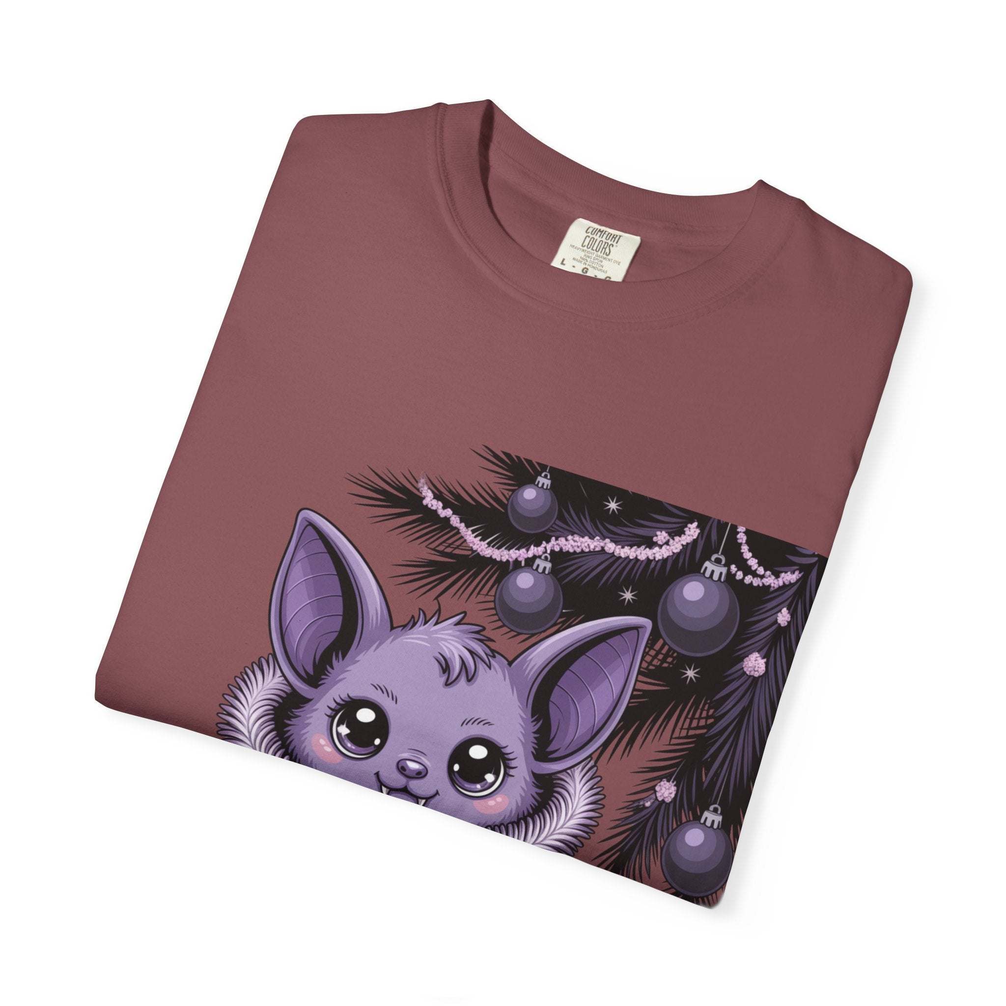 Folded Gothmas Bat T-Shirt with cute purple bat and dark festive design on garment-dyed soft cotton tee