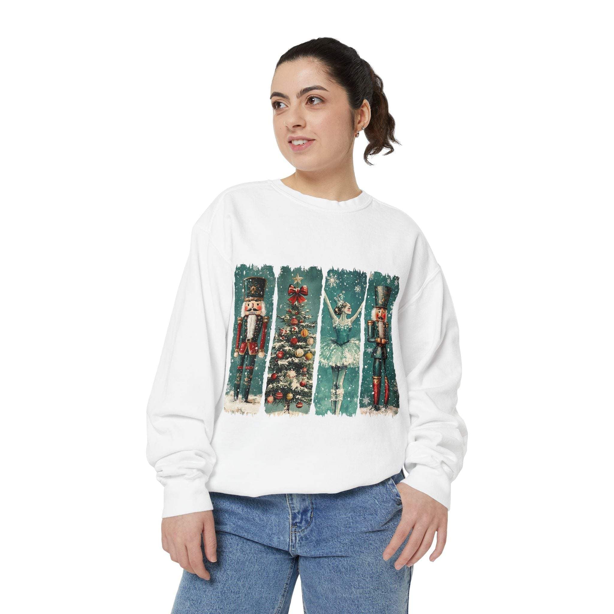 Woman wearing white Vintage Christmas Nutcracker sweatshirt with watercolor nutcracker and holiday design.