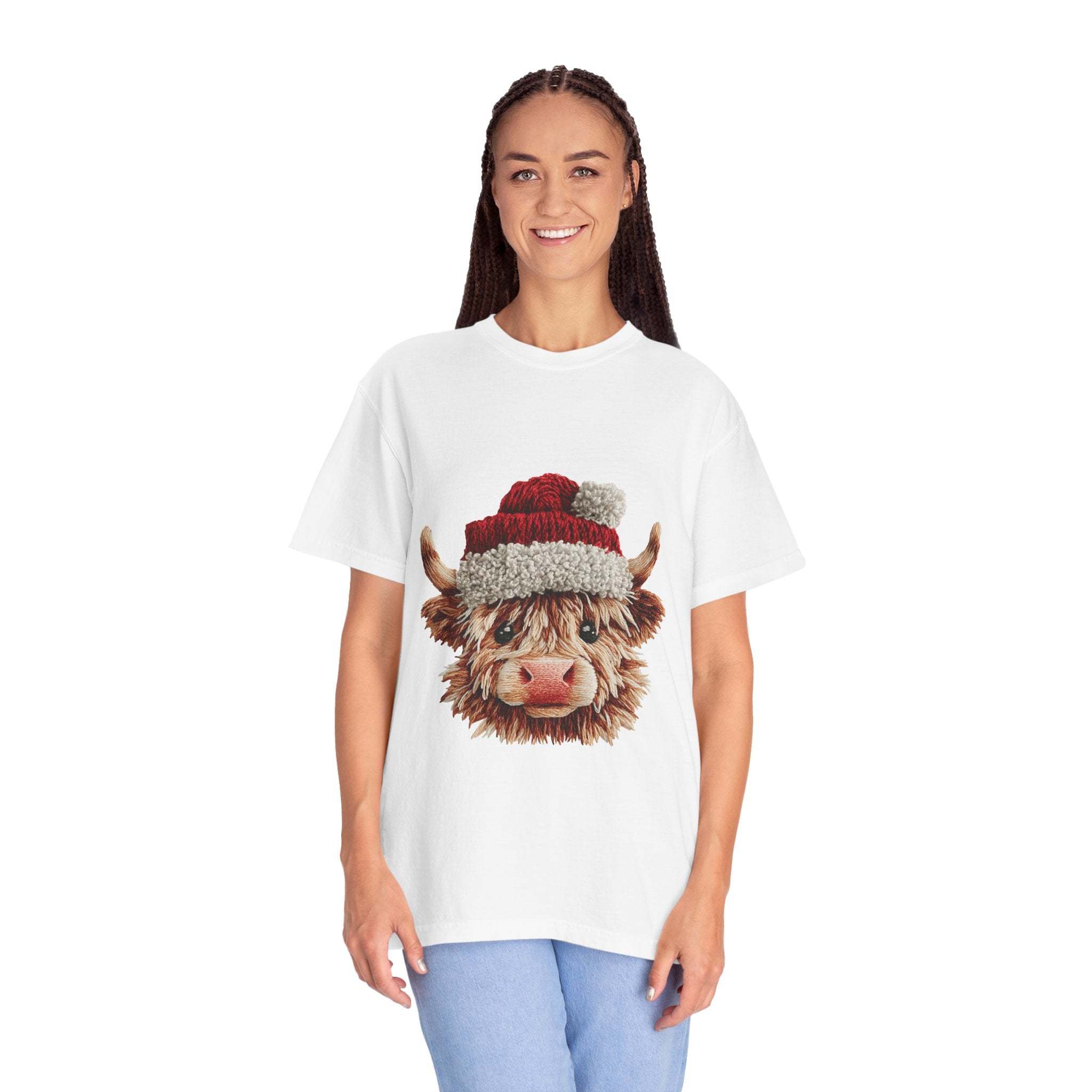 Woman wearing white T-shirt with faux crochet yarn highland cow Santa print
