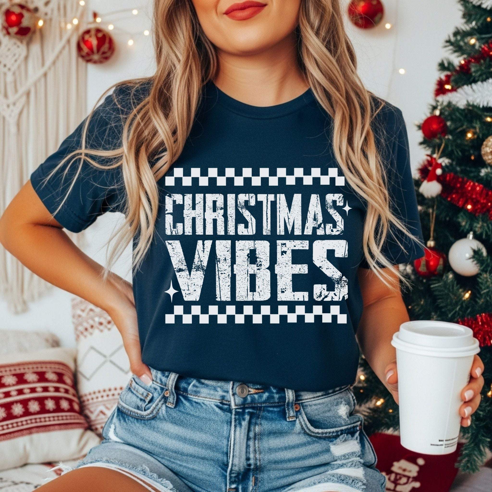 Black distressed 'Christmas Vibes' t-shirt, garment-dyed for a casual holiday look by Printify