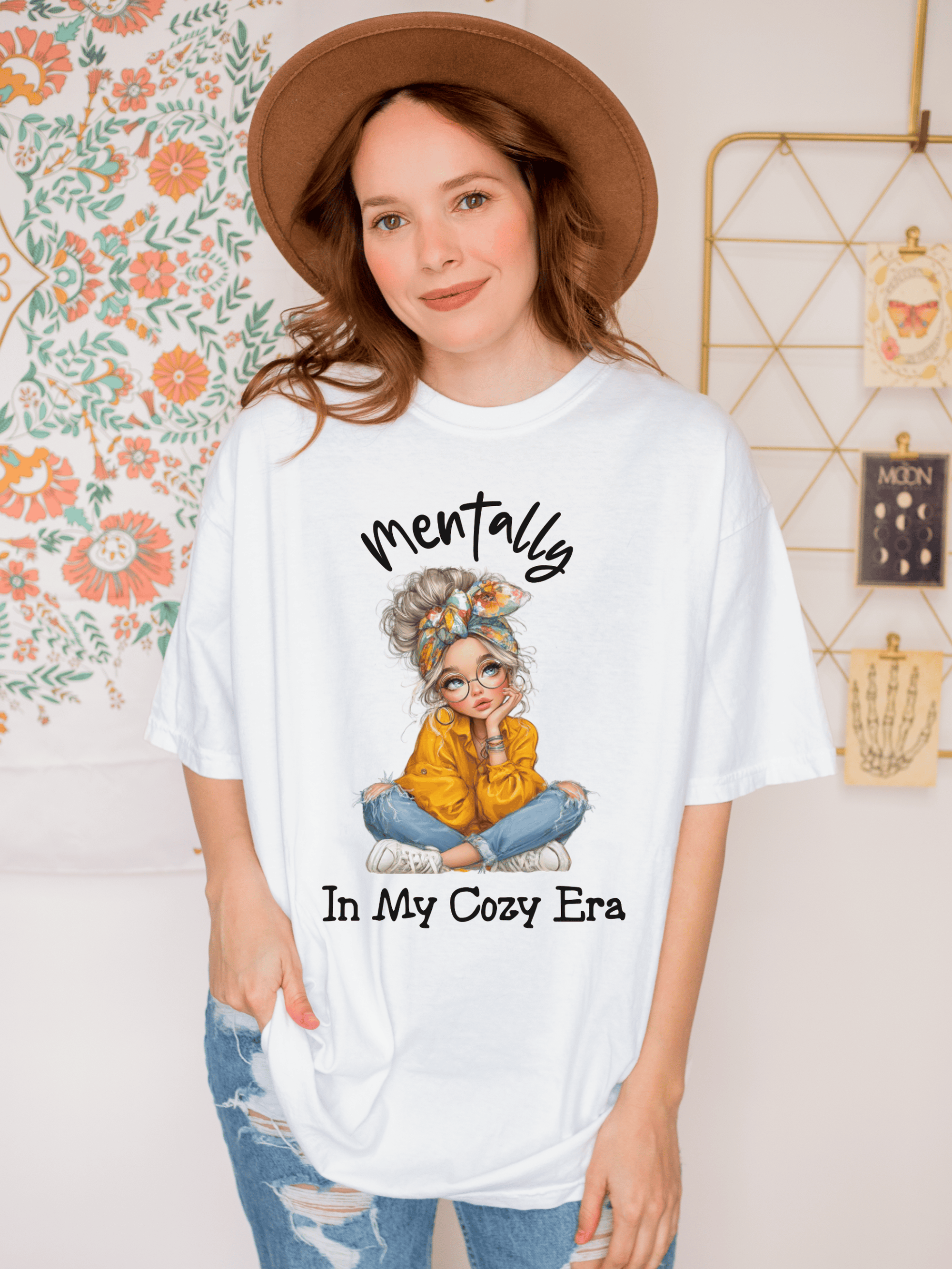 Black cozy t-shirt with 'Mentally in My Cozy Era' graphic by Printify, perfect for casual wear and relaxation.