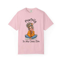 Pink t-shirt with a graphic of a woman and text on a white background