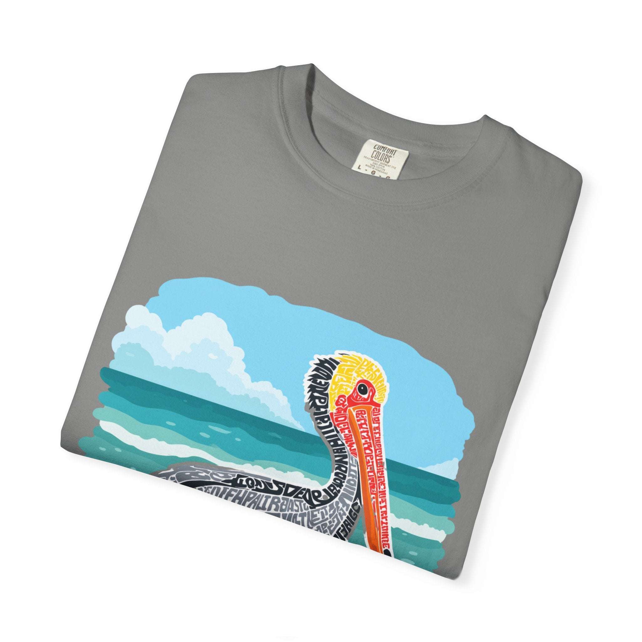 Vintage Pelican Letter Poster graphic on coastal-themed garment-dyed tee shirt
