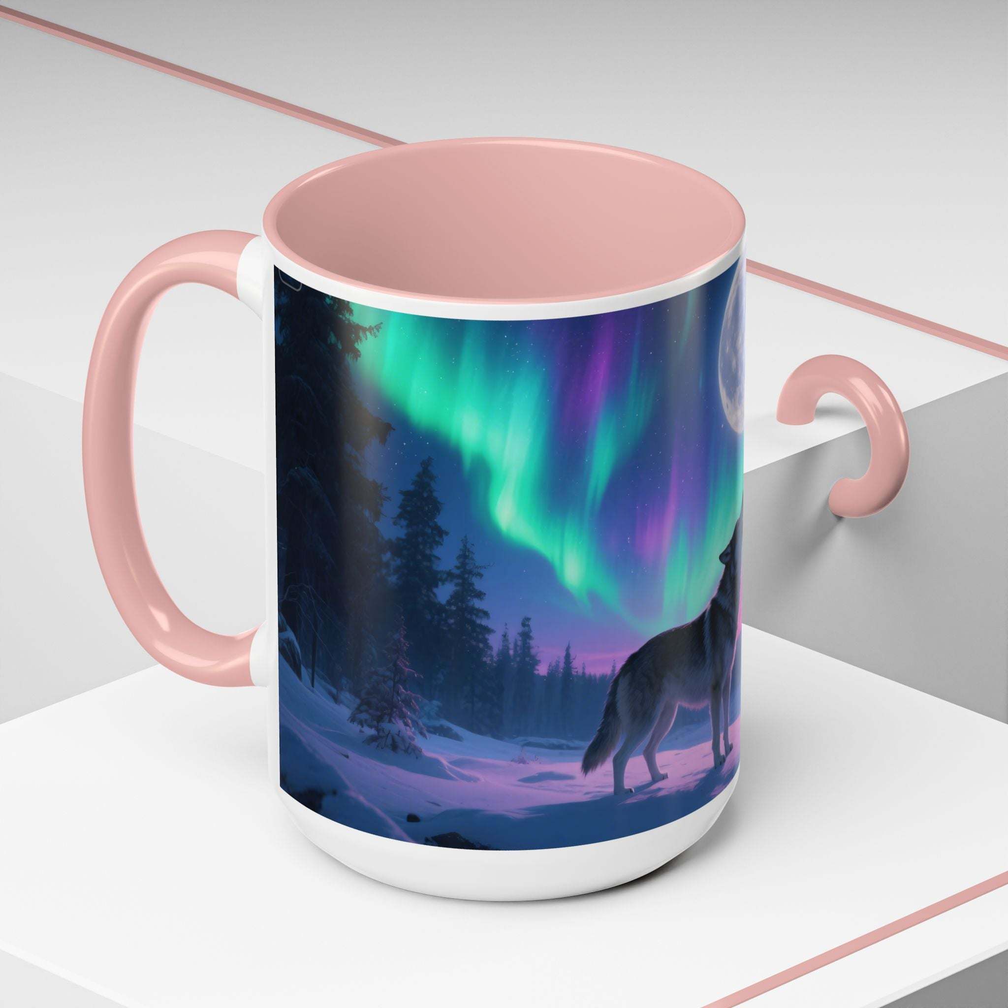 Ceramic mug with howling wolf silhouette and northern lights aurora design, pink interior and handle, microwave and dishwasher safe