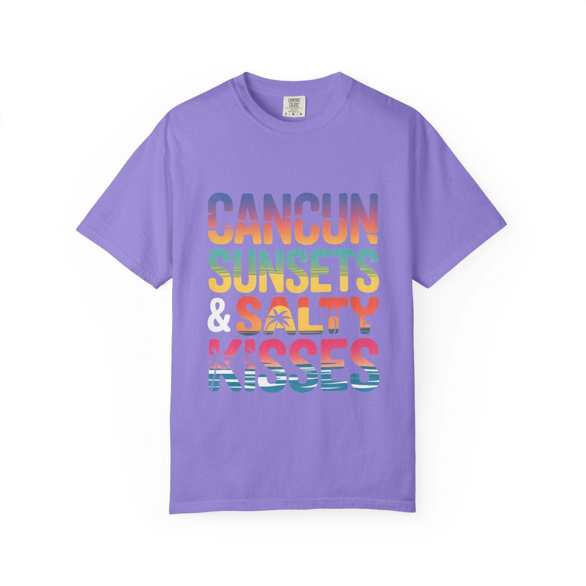 Purple t-shirt with colorful text 'Cancun Sunsets & Salty Kisses' on a white background