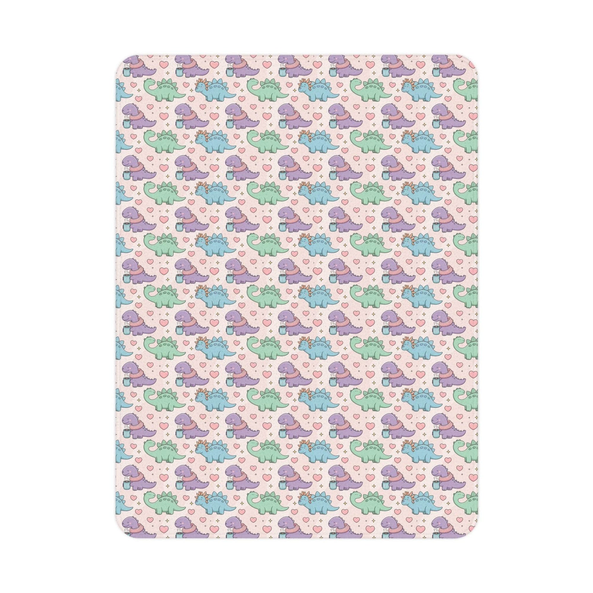 Toddler blanket with pastel dinosaurs wearing scarves on soft fleece fabric