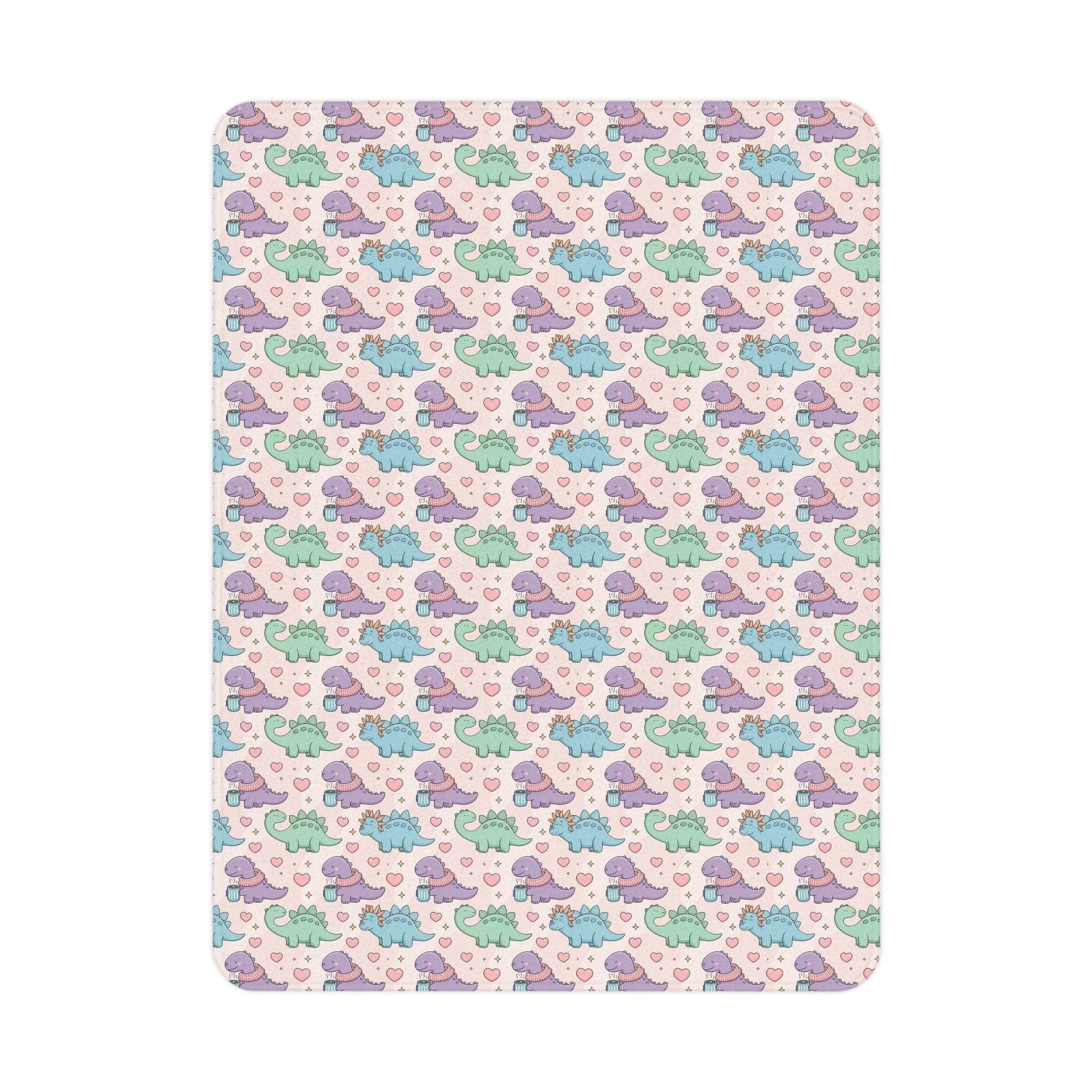 Toddler blanket with pastel dinosaurs wearing scarves on soft fleece fabric