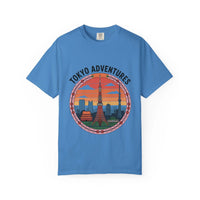 Blue garment-dyed T-shirt with Tokyo Adventures travel graphic and cityscape design