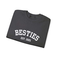 Folded dark gray varsity besties crewneck sweatshirt with white "BESTIES EST. 2025" lettering