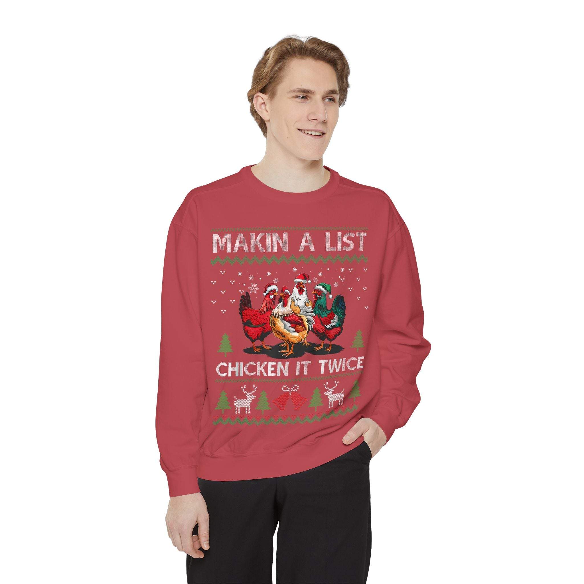 Red garment-dyed sweatshirt with "Making a List, Chicken it Twice" Christmas design featuring chickens and holiday motifs