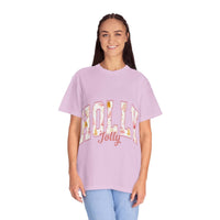 Woman wearing lavender Varsity Holly Jolly T-shirt with festive text, relaxed fit and garment-dyed cotton fabric