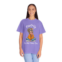 Woman wearing lavender Mentally in My Cozy Era t-shirt with cozy graphic design