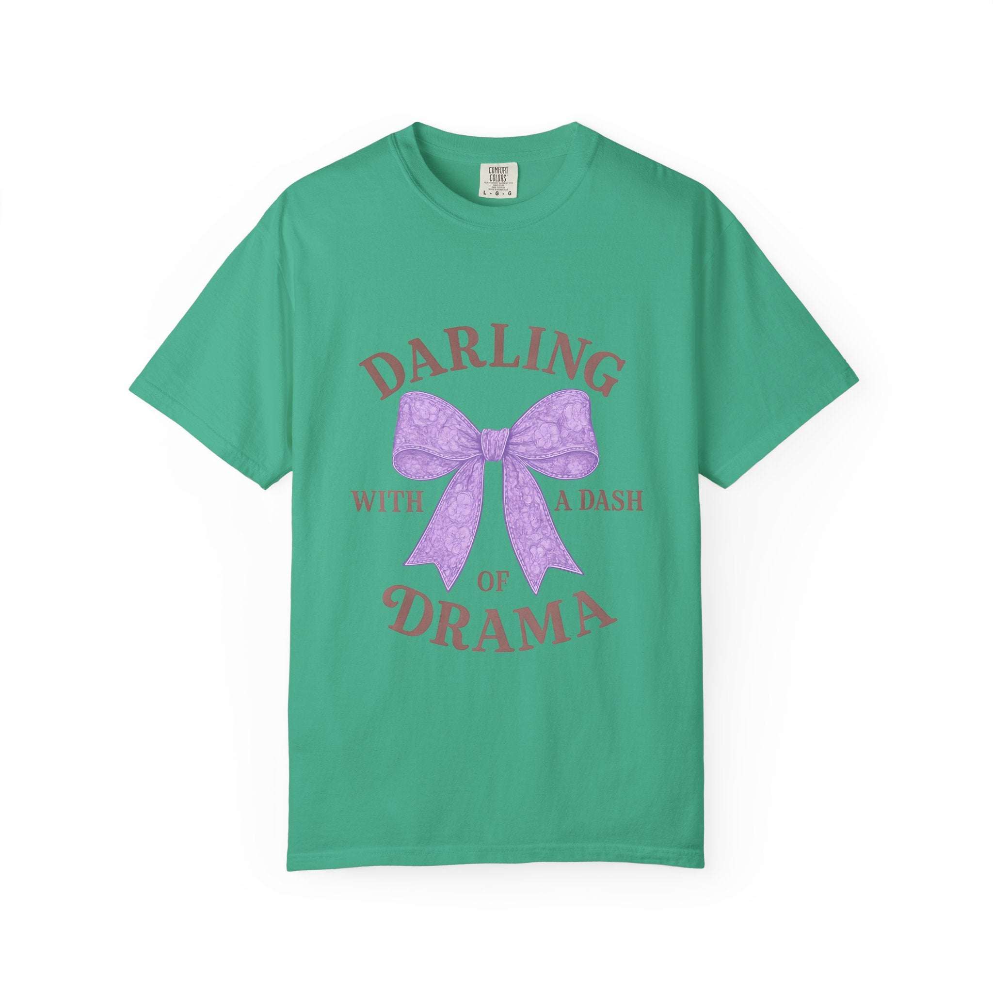 Green t-shirt with a purple bow and text on a white background