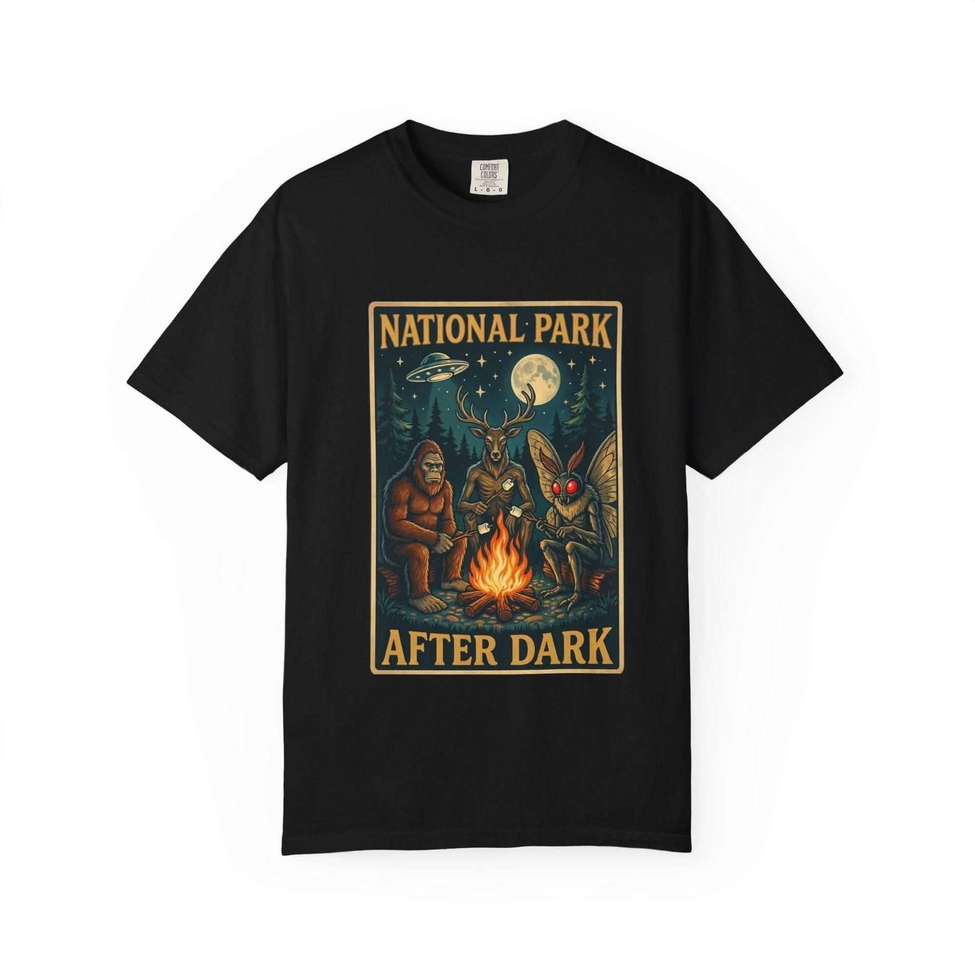 Vintage National Park After Dark t-shirt featuring campfire, Sasquatch, Mothman, and night creatures design on garment-dyed heavyweight cotton