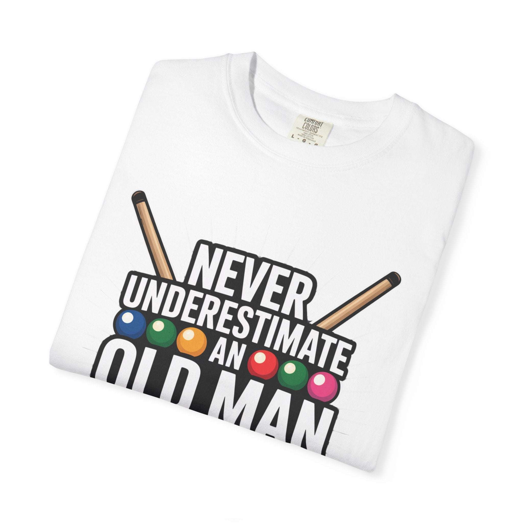 White t-shirt with "Never Underestimate An Old Man" text and pool cue design on chest