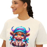Women's boxy tee featuring a moody girl highland cow graphic, 100% cotton, vintage pigment dye, casual fit