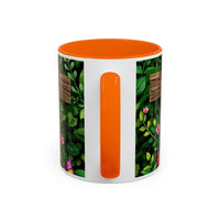 Mug with floral pattern and orange interior on a white background