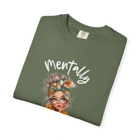 Mentally in my Cozy Era green t-shirt with hand-lettered text and illustration of a girl with glasses and a floral headscarf