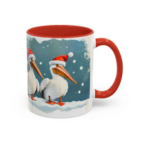 Mug with Christmas design featuring two pelicans wearing Santa hats on a snowy background.