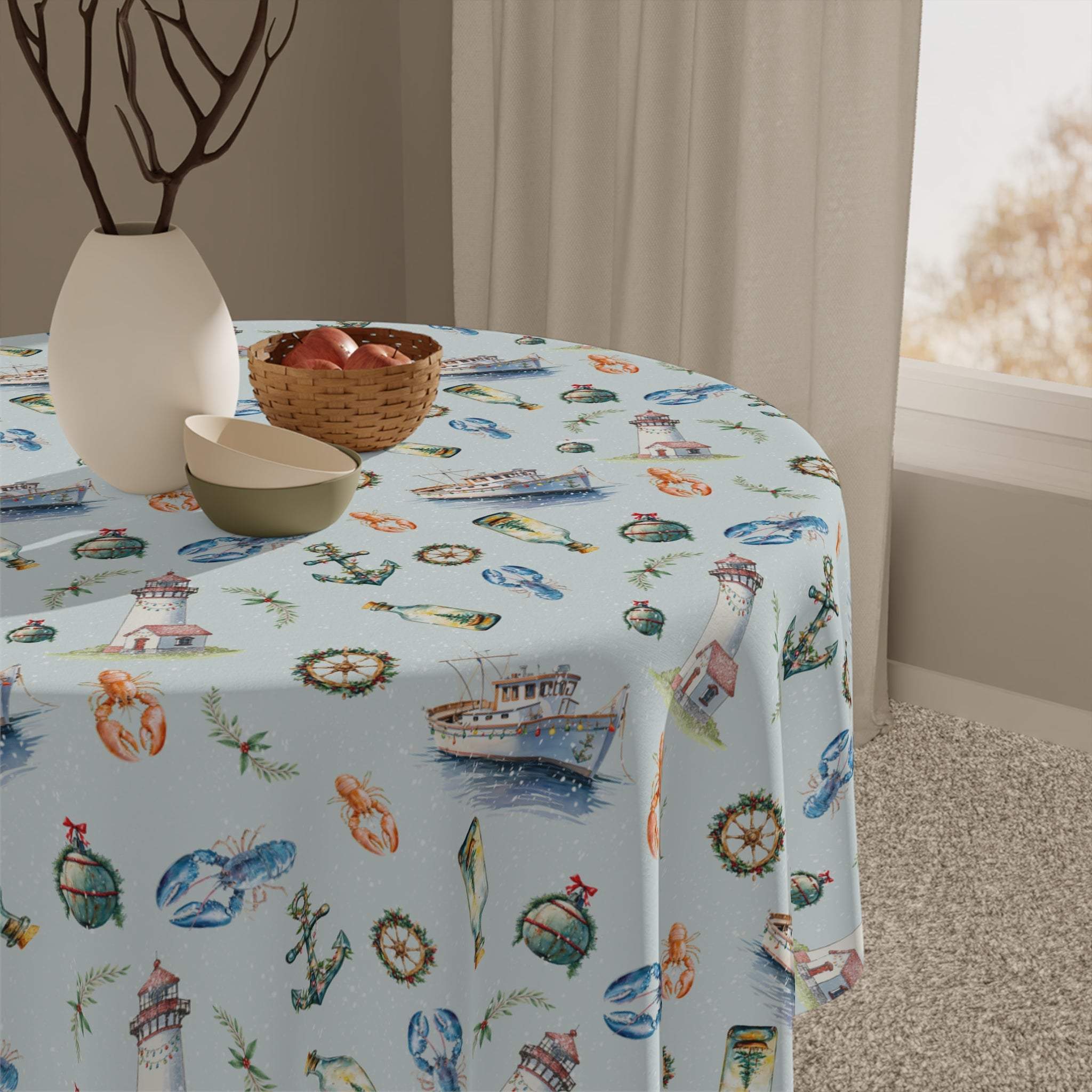 Coastal Christmas tablecloth with lighthouses, boats, sea creatures, and festive nautical decor on light blue fabric
