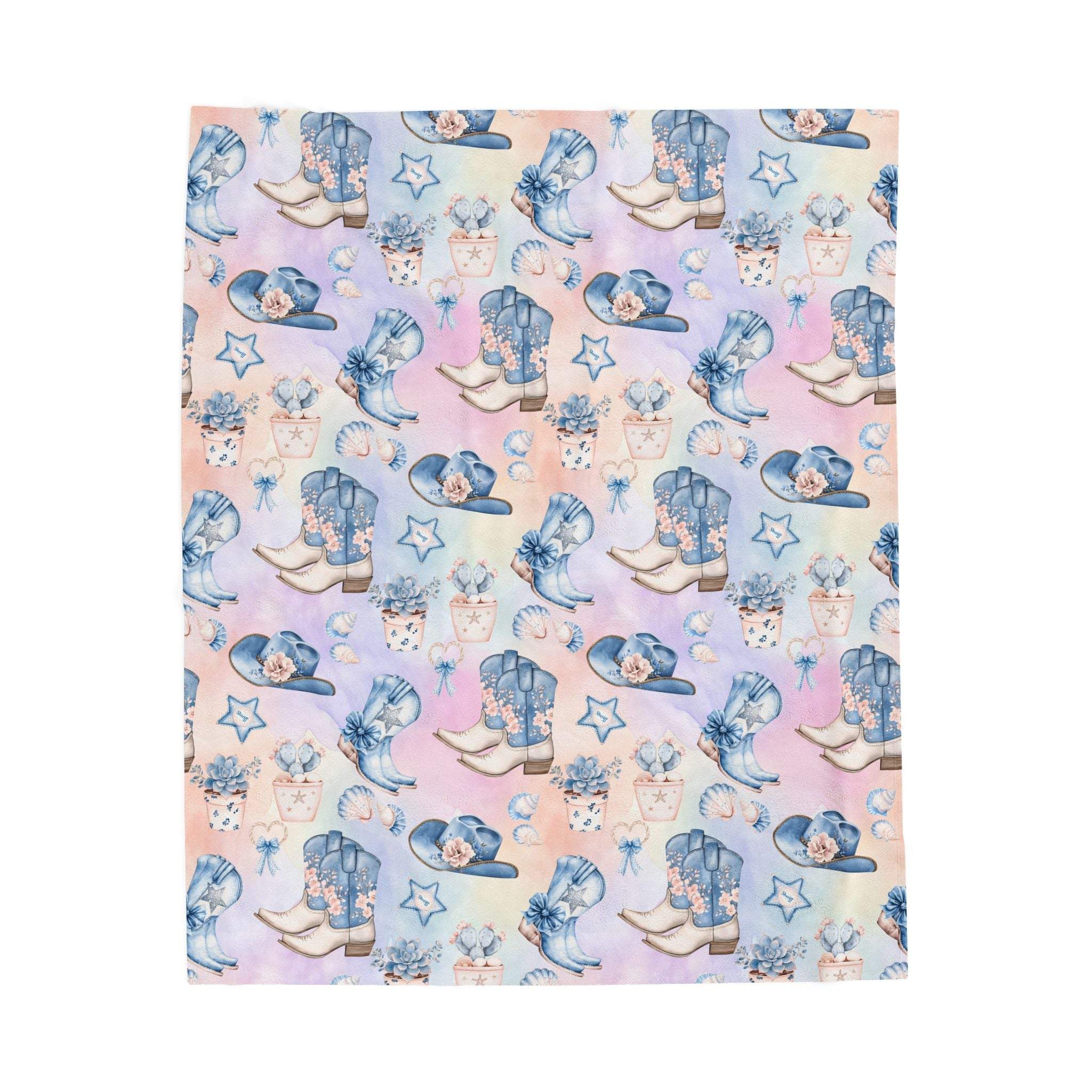 Coastal Cowgirl Plush Blanket draped over sofa with western design