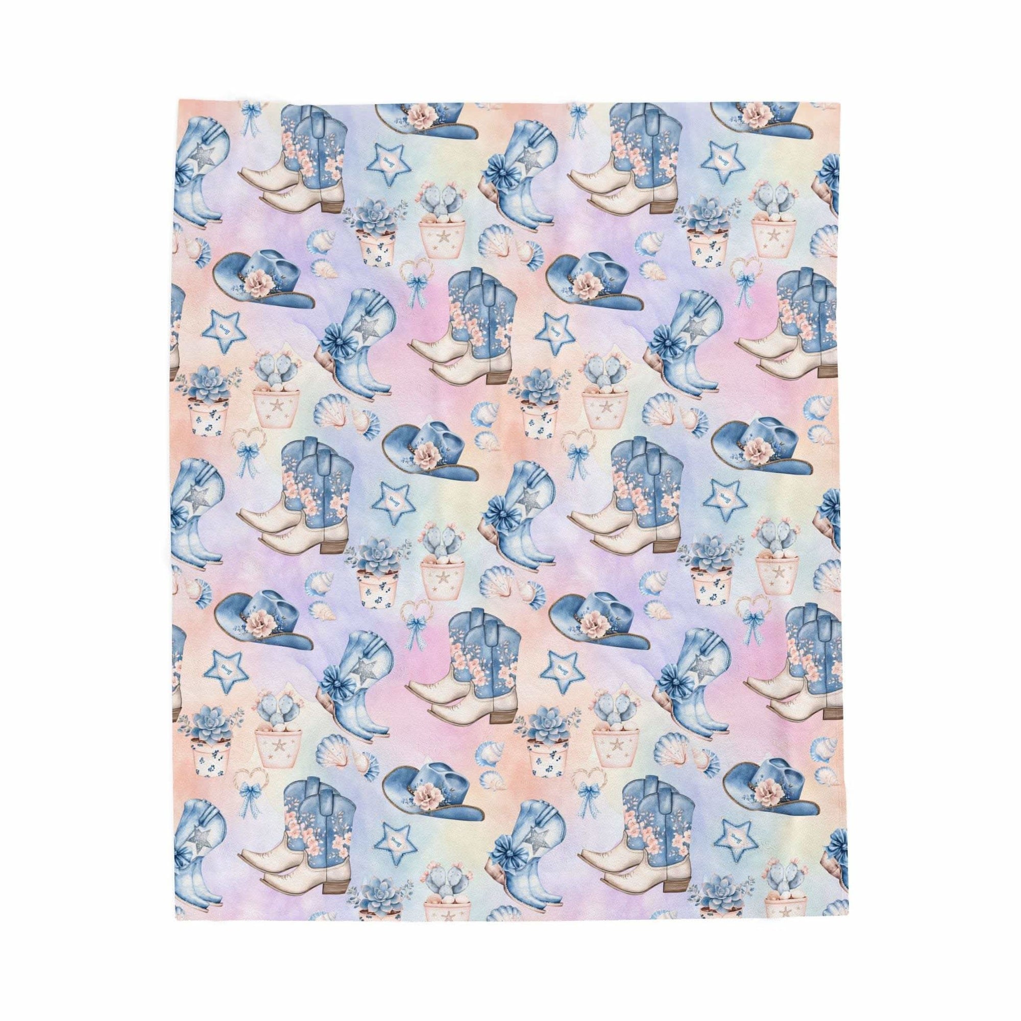 Coastal Cowgirl plush blanket draped over sofa with western design and soft fabric