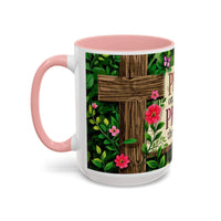 Mug with floral design and pink handle on a white background