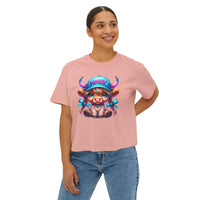 Woman wearing pink boxy tee with moody girl highland cow graphic on front