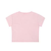 Women wearing a vintage-inspired snow washed crop top with round neck and drop shoulder sleeves in casual streetwear style