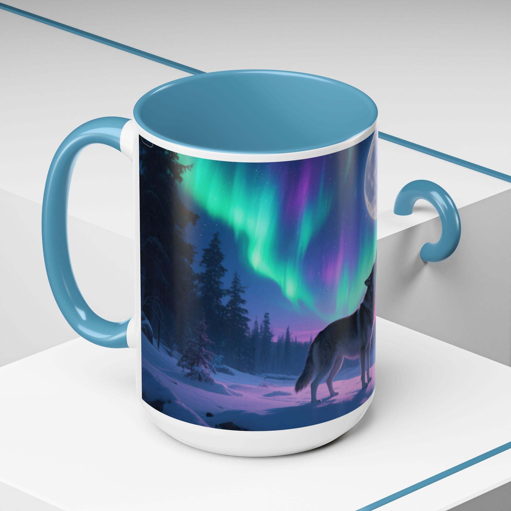 Mug with a design of two wolves under a Northern Lights sky on a white surface.