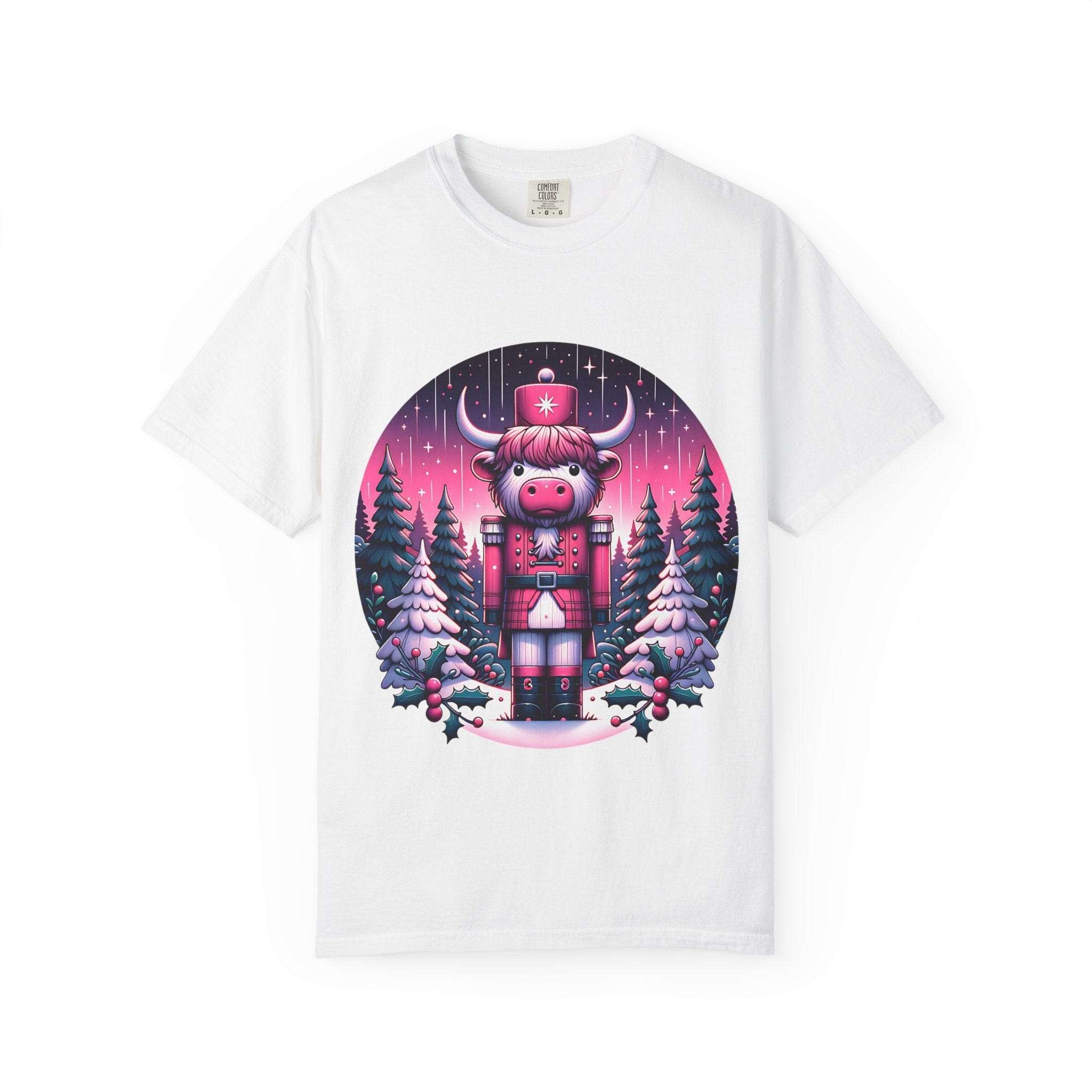 White Cow Nutcracker T-shirt with festive Highland cow nutcracker design and snowy pine trees background