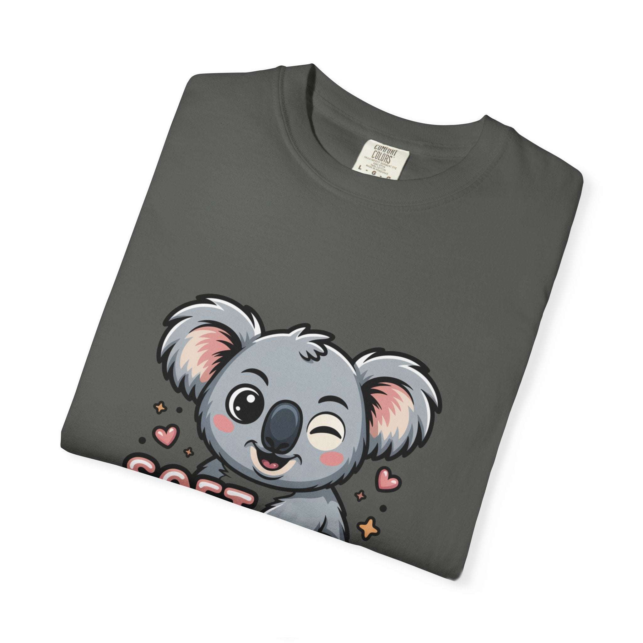 Folded gray t-shirt with winking koala graphic and "Soft on the Outside, Savage on the Inside" text design