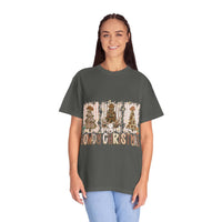 Cowboy Howdy Christmas t-shirt with festive cowboy tree design on gray cotton fabric worn by smiling woman