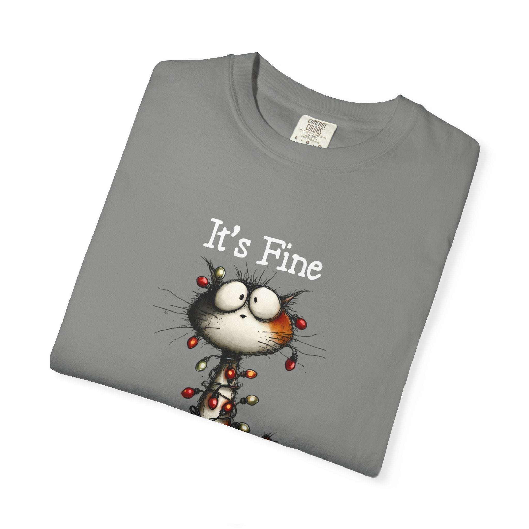 Folded gray t-shirt with a cartoon cat and 'It's Fine' text on a white background