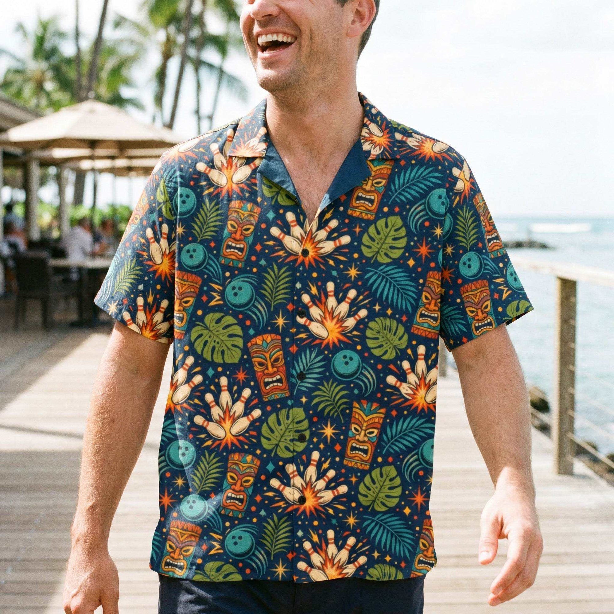 Navy tropical bowling Hawaiian shirt with tiki masks, bowling pins, and jungle leaves print, camp collar, and button-down style.