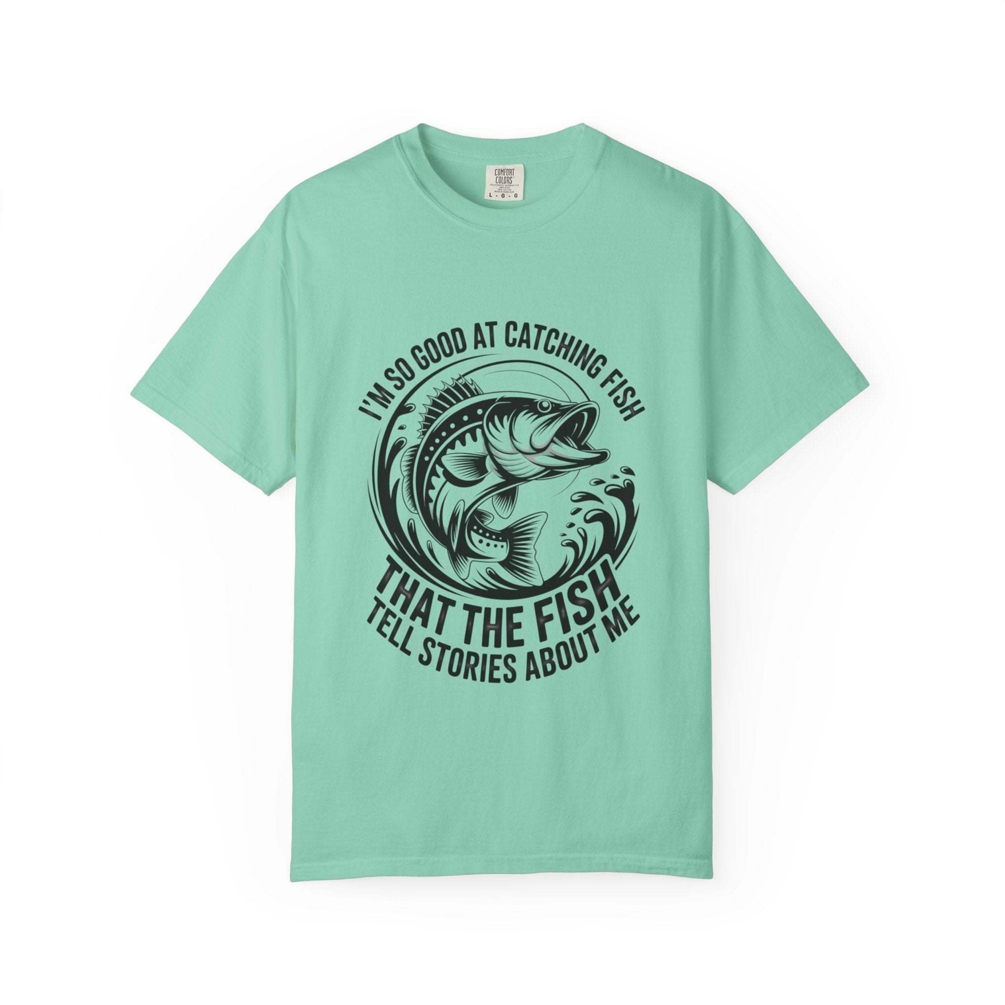 Fishing T-Shirt with humorous "So Good At Catching Fish That The Fish Tell Stories About Me" slogan on soft cotton tee