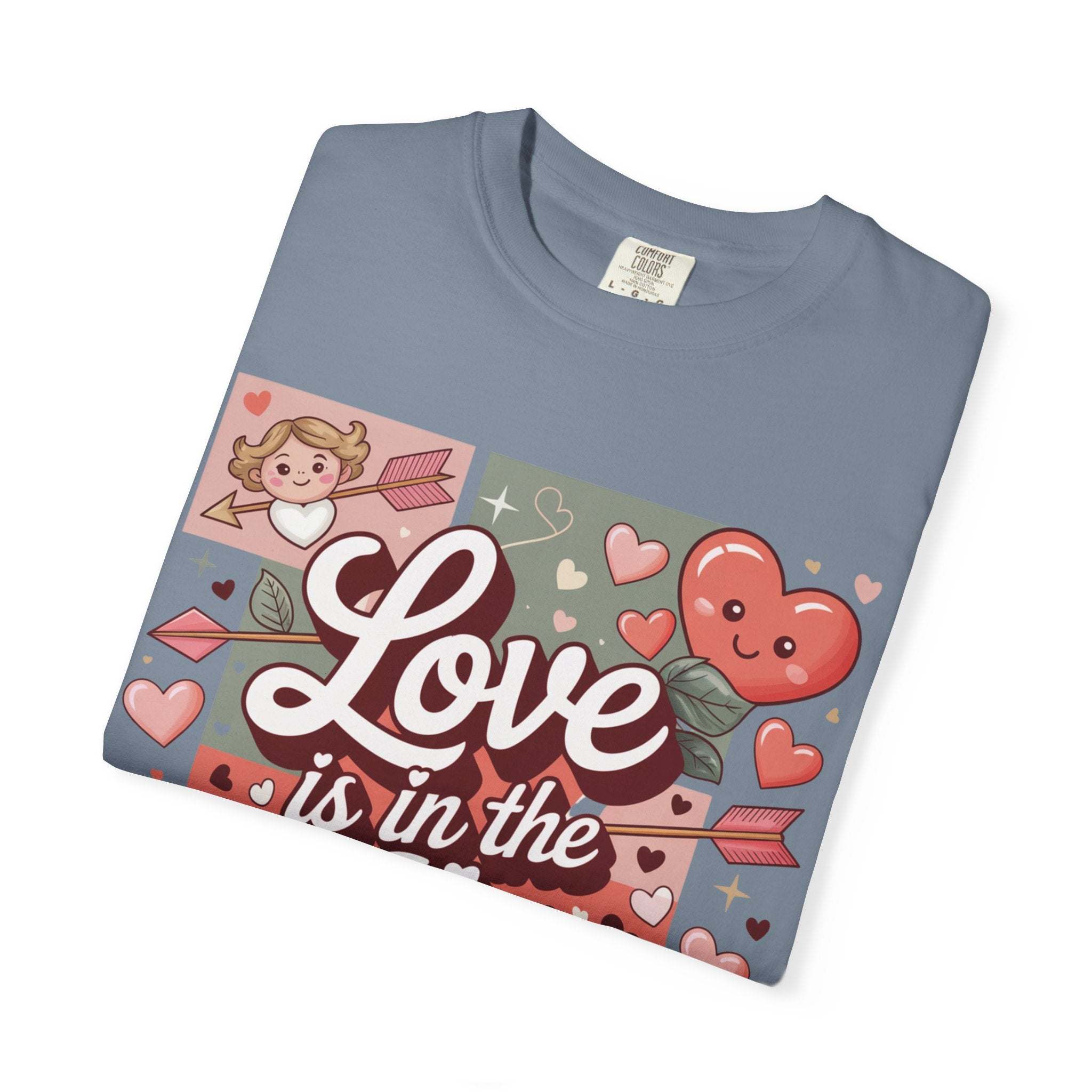 Valentine's t-shirt with hearts and vintage look, featuring "Love Is in the Air" design