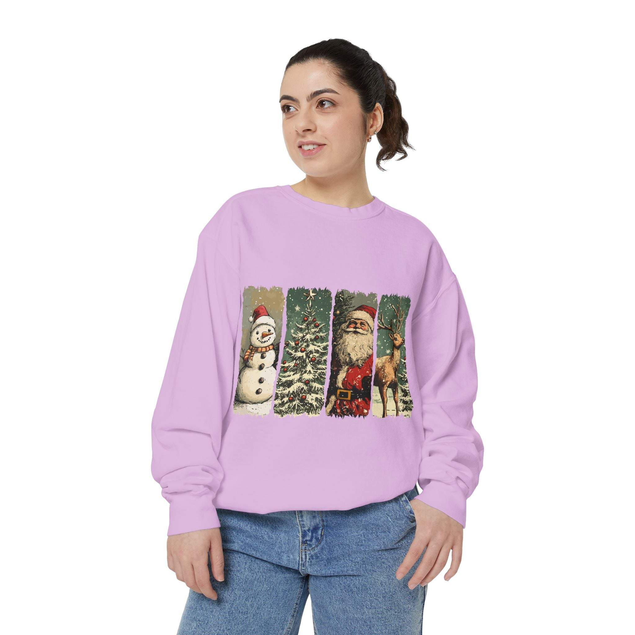 Woman wearing vintage Christmas sweatshirt with watercolor swatches of snowman, tree, Santa, and reindeer on lavender fabric