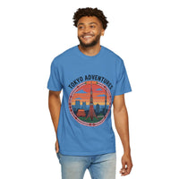 Garment-dyed Tokyo Adventures travel T-shirt with Japanese landmarks design worn by smiling man