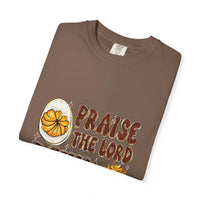 White cotton t-shirt featuring 'Praise the Lord, Devil the Eggs' design, perfect for Easter and Christian apparel.
